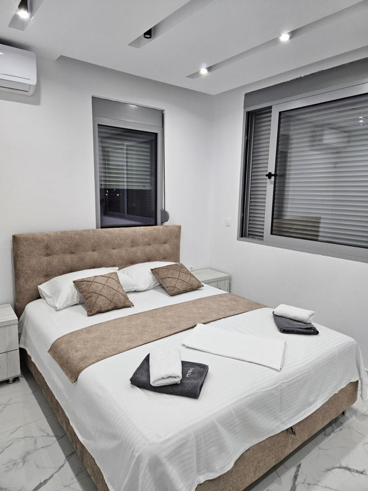 Nesi Apartments อุลซิน ภายนอก รูปภาพ